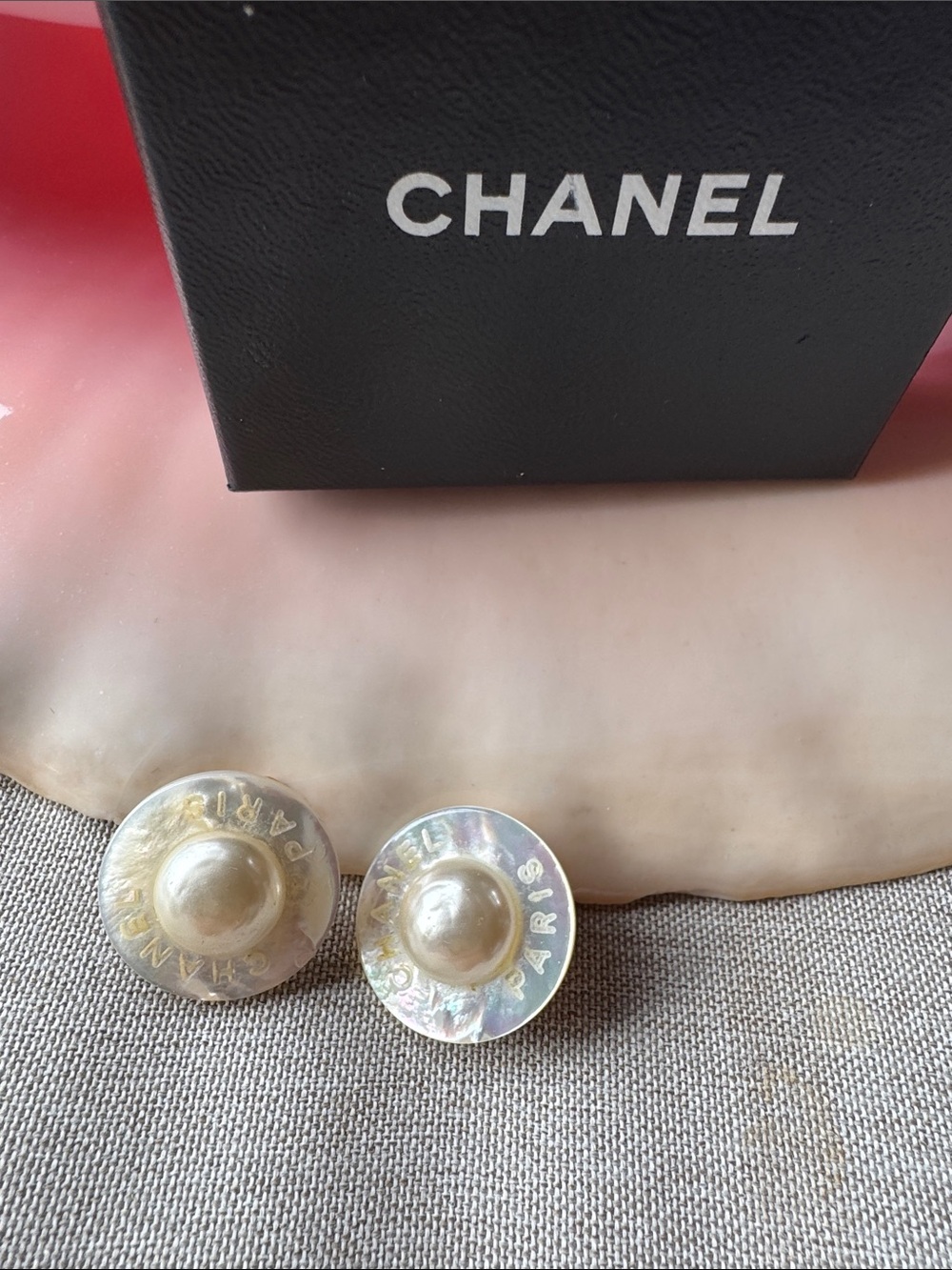CHANEL Iridescent Pearl Button Earrings with Logo Rim